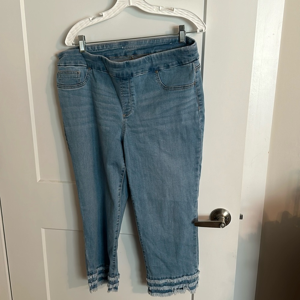 Chicos size 2 stretchy jeans capri with ragged hem.  Fits size 12-16